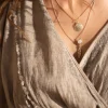 Collier en coquillage doré